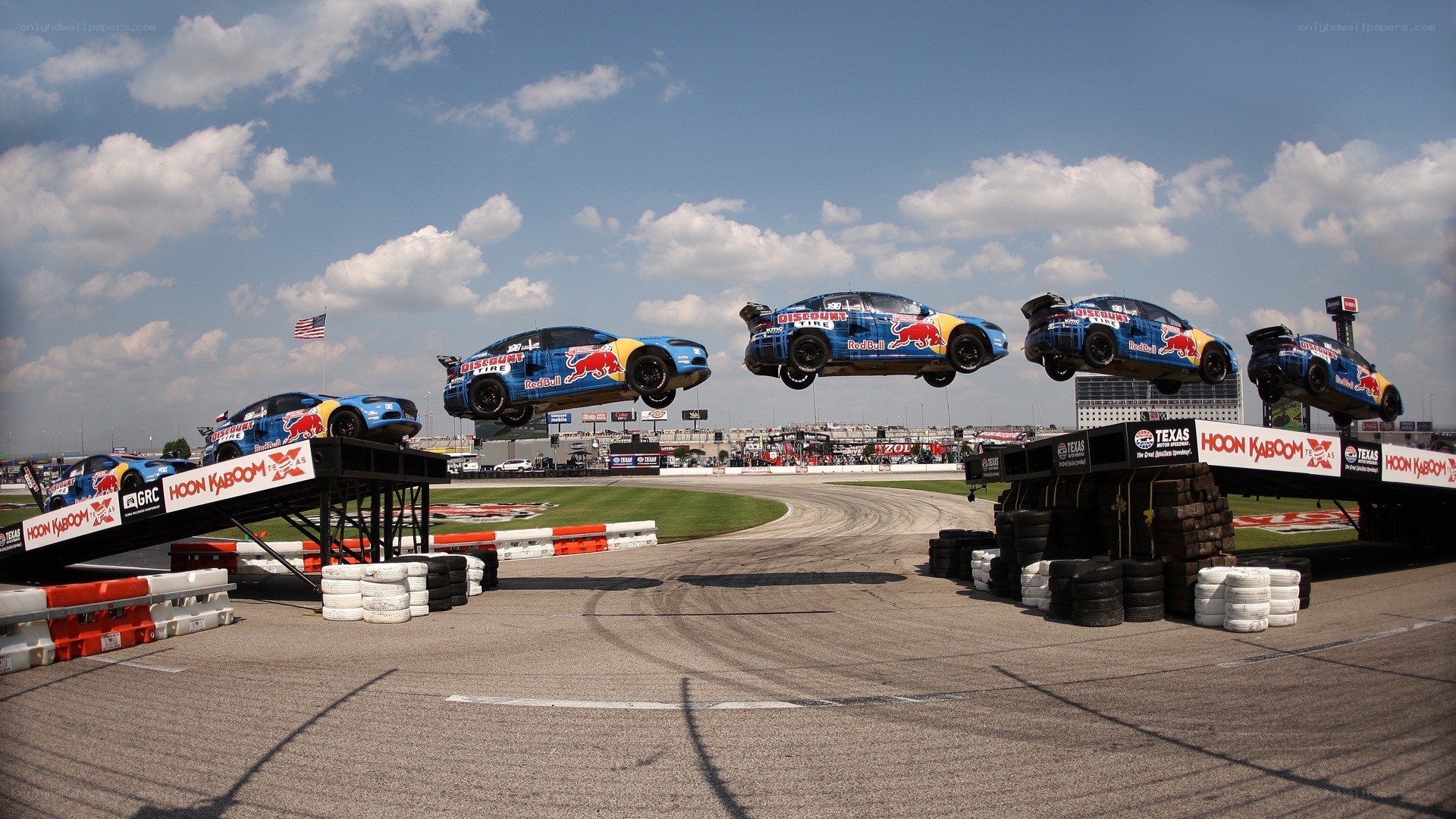 Cars jumping over ramps