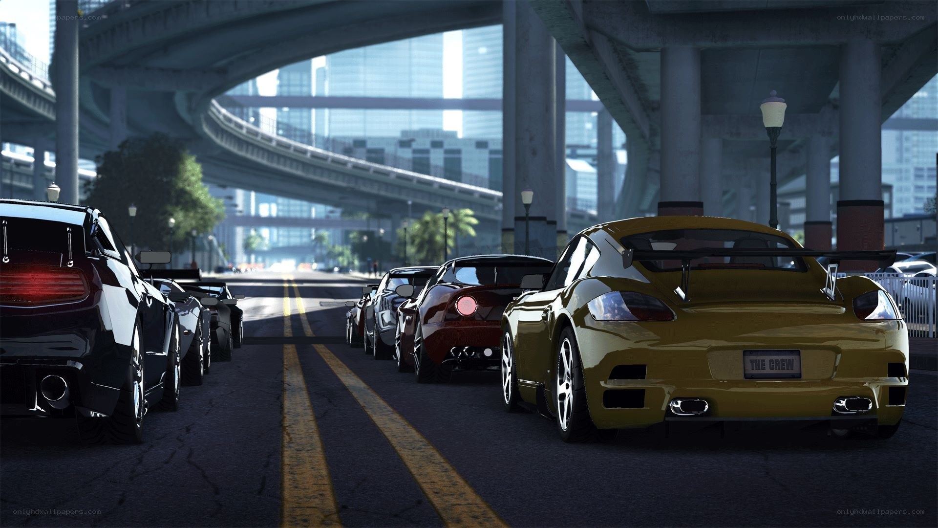 cars lined up under highway