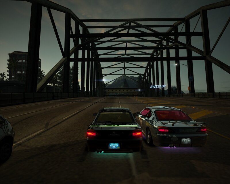 Cars on a bridge at dusk