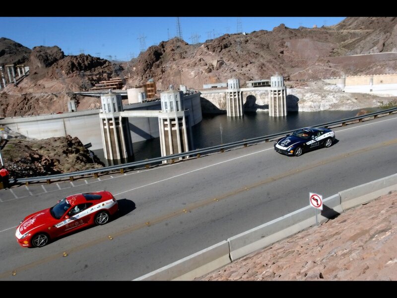 Cars on a bridge near a dam