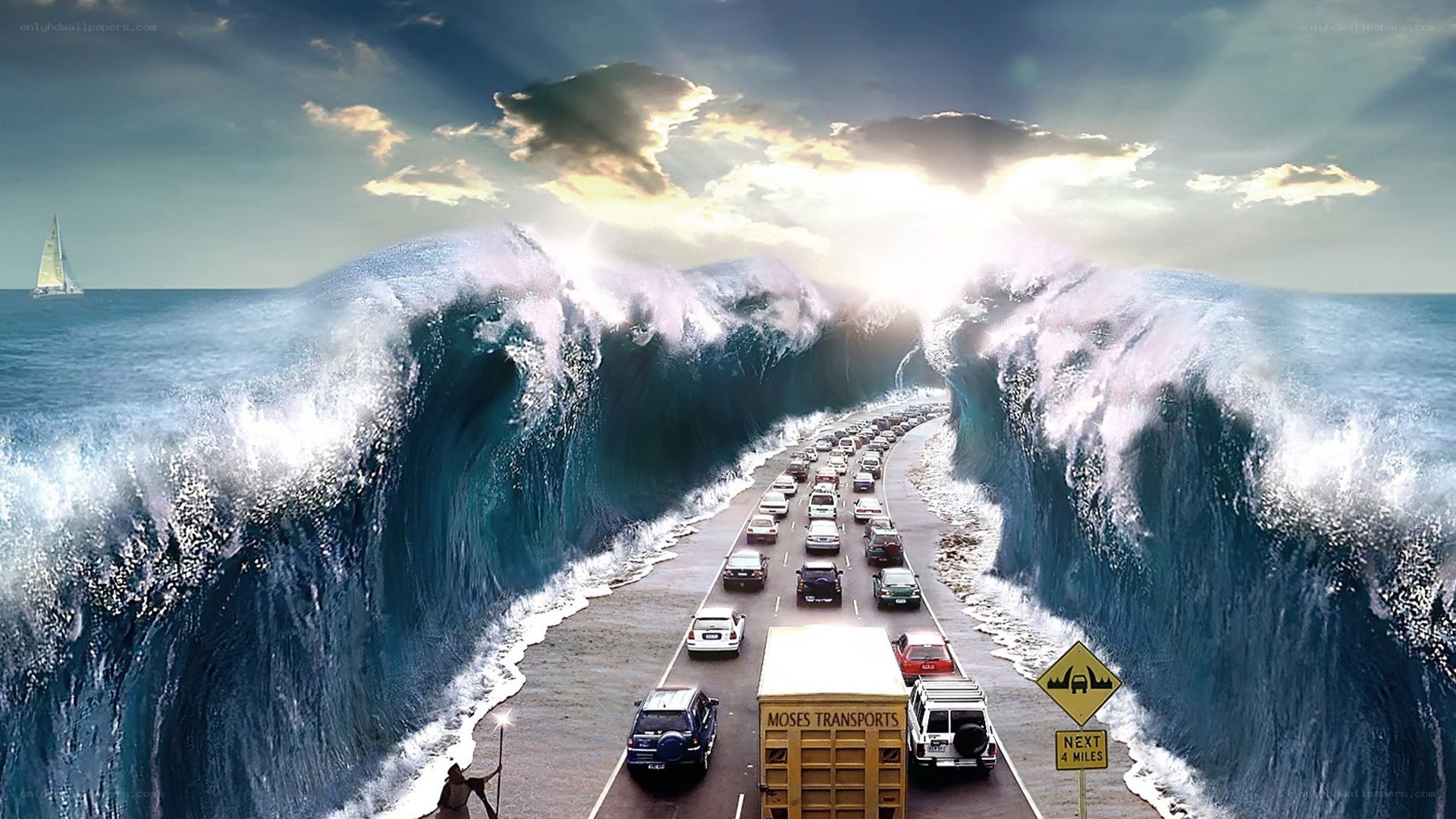 Cars on a road split by giant waves