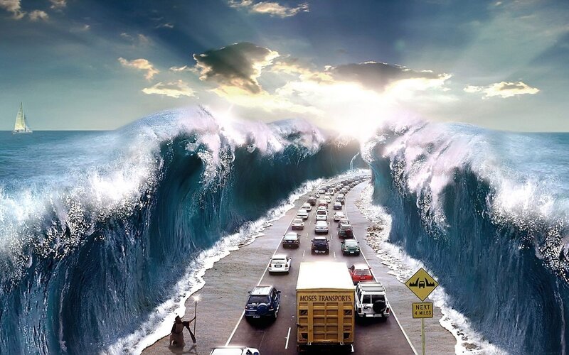 Cars on a road through parted sea