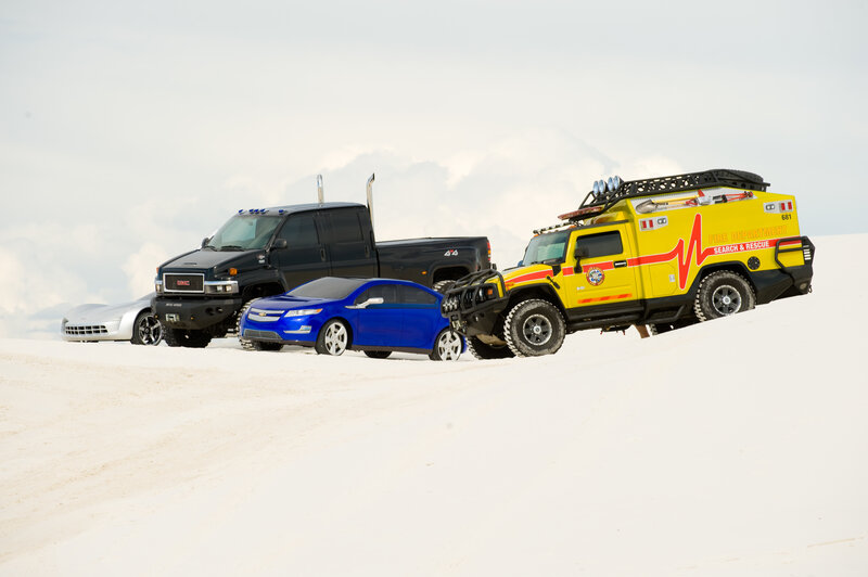 Cars on a sand dune