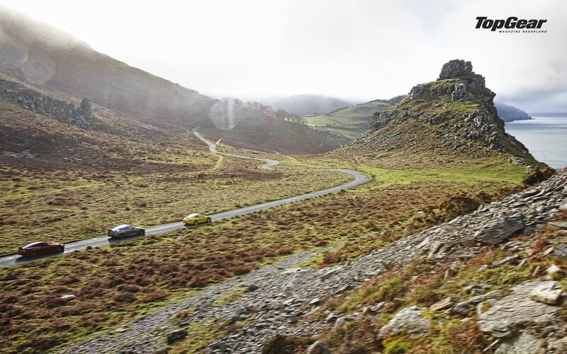 Cars on a winding coastal road