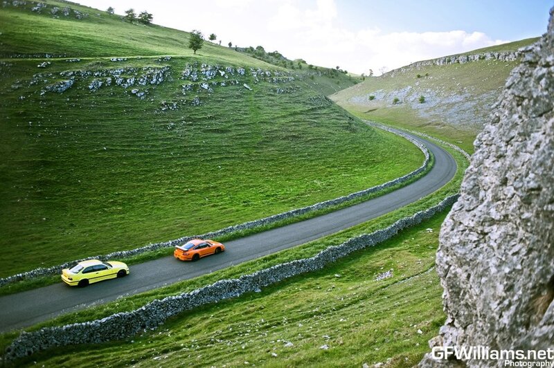 Cars on a winding country road