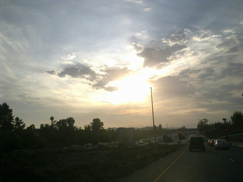 Cars on Highway at Sunset