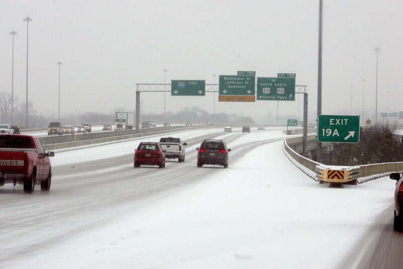 Cars on Snowy Highway