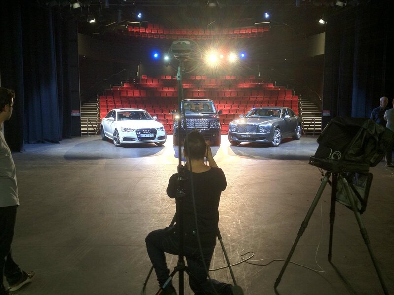 Cars on stage for photoshoot