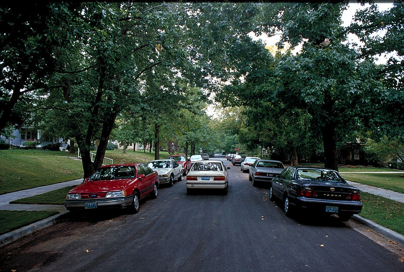 Cars Parked on a Street — Green
