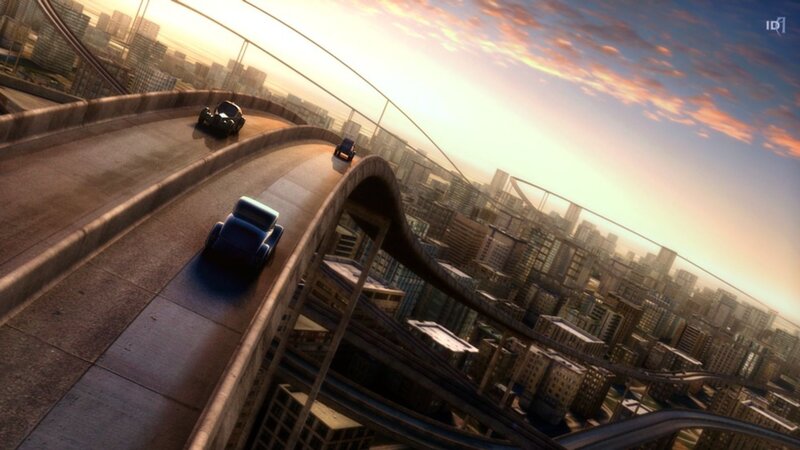 cars racing on a curved highway