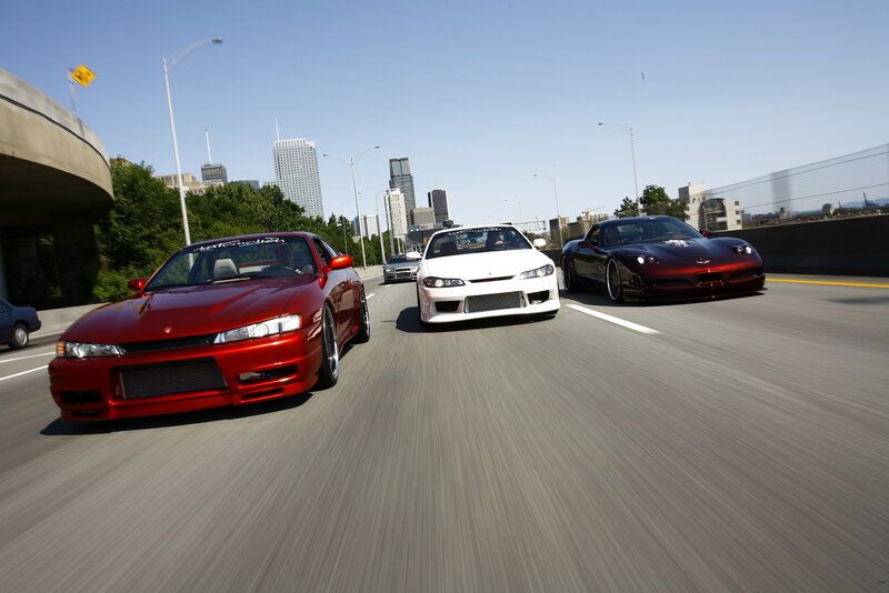 Cars racing on a highway