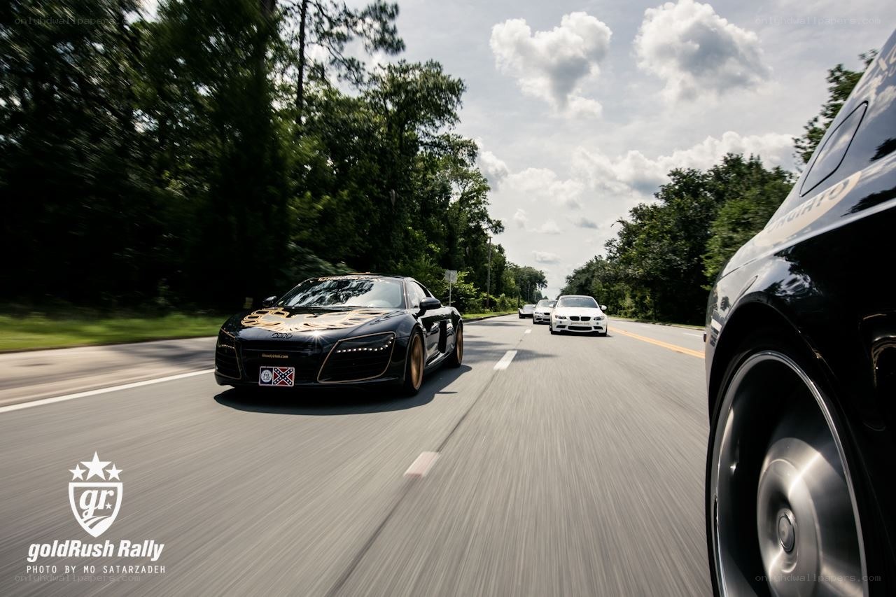 Cars racing on a road