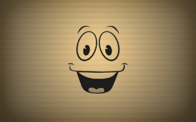 cartoon face on brown background