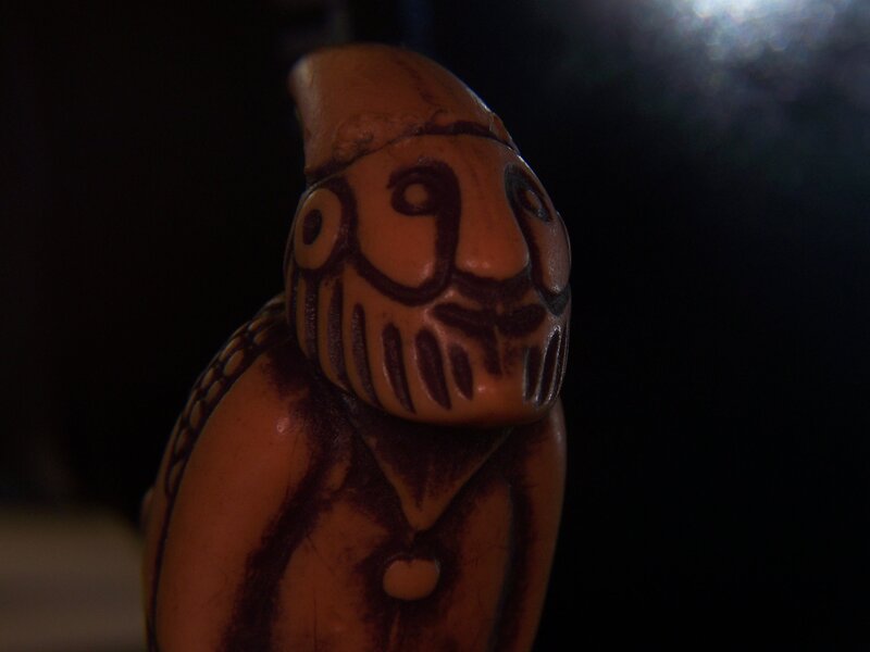 carved figurine with face