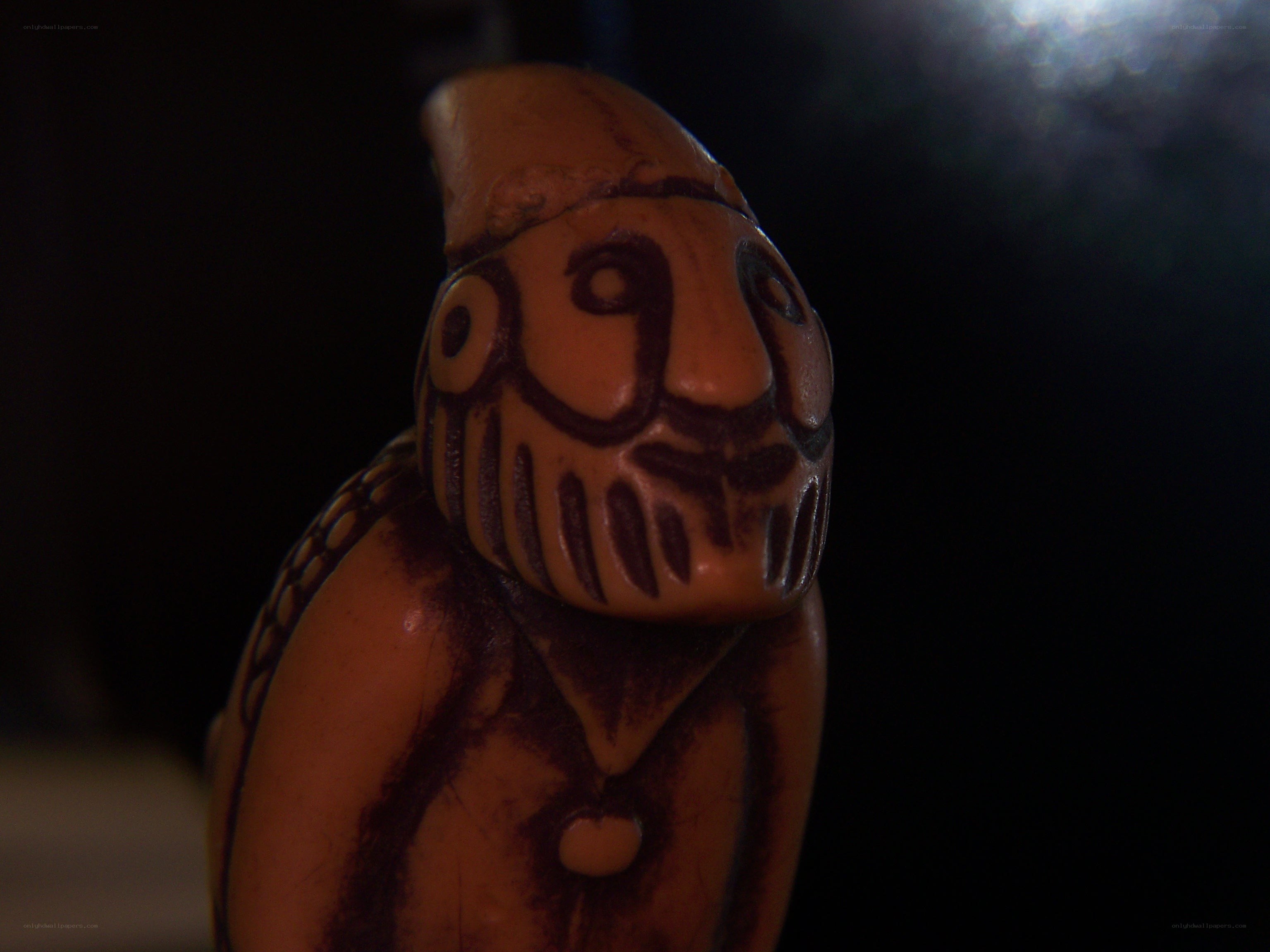 carved figurine with face