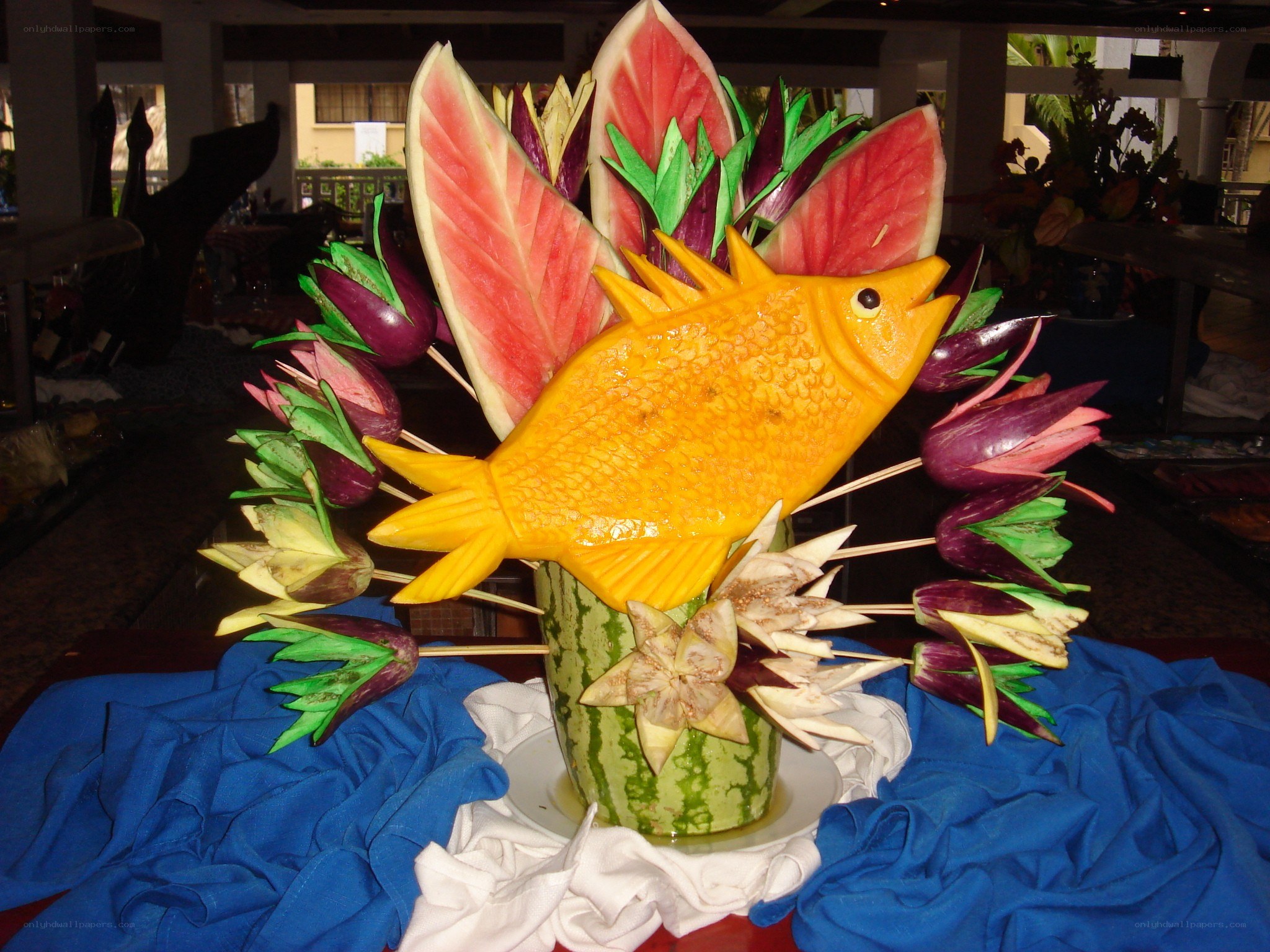 Carved fruit fish sculpture