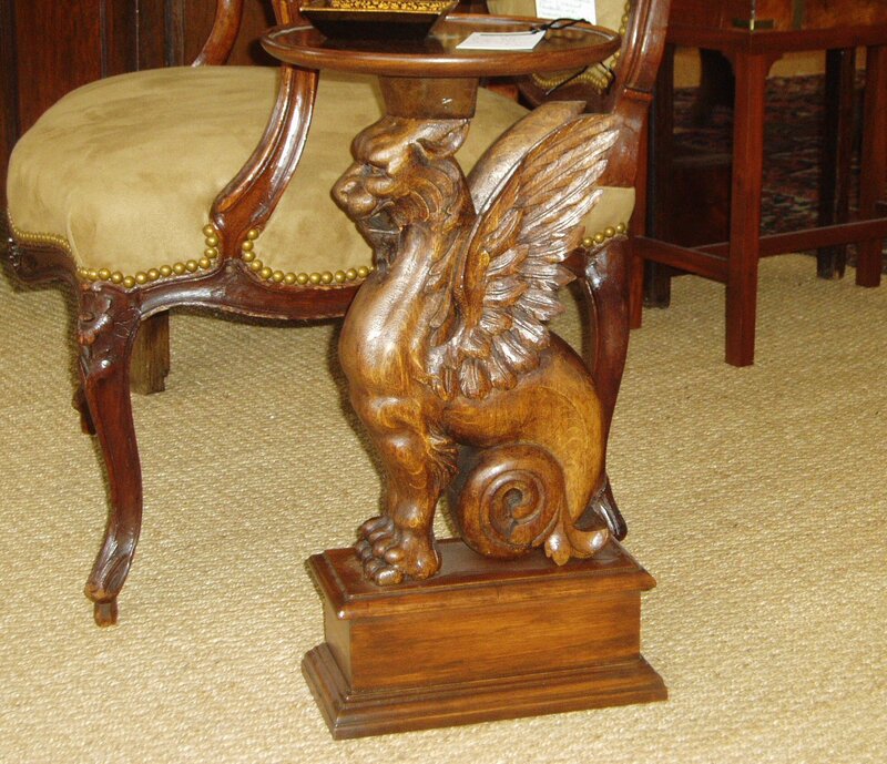carved gryphon table base
