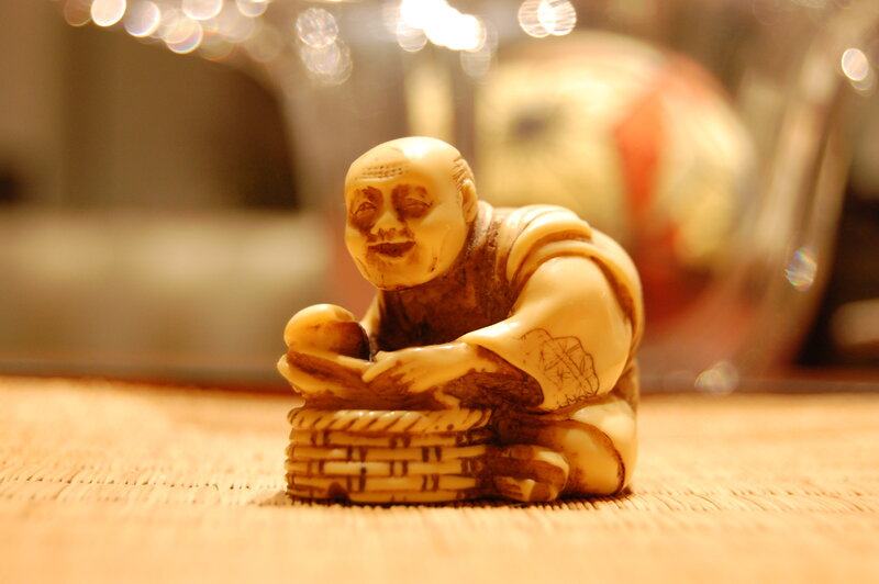 carved ivory figurine of monk