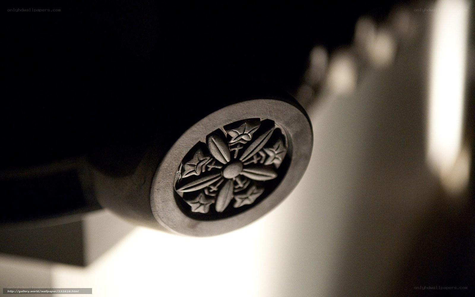 carved metal emblem detail