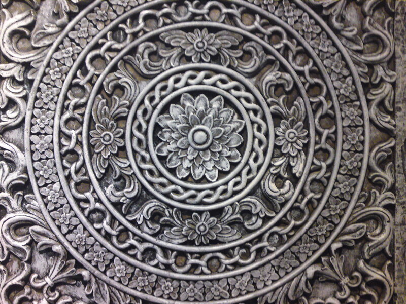 Carved Metal Medallion
