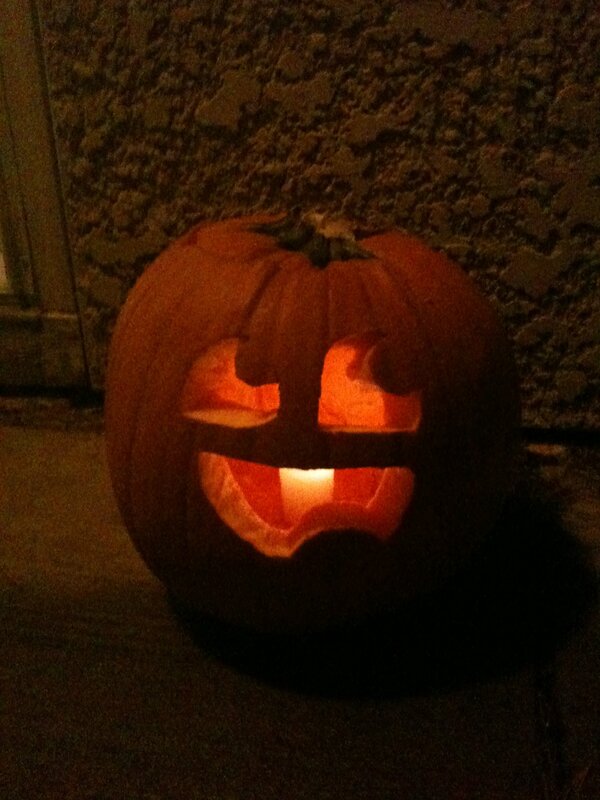 carved pumpkin at night