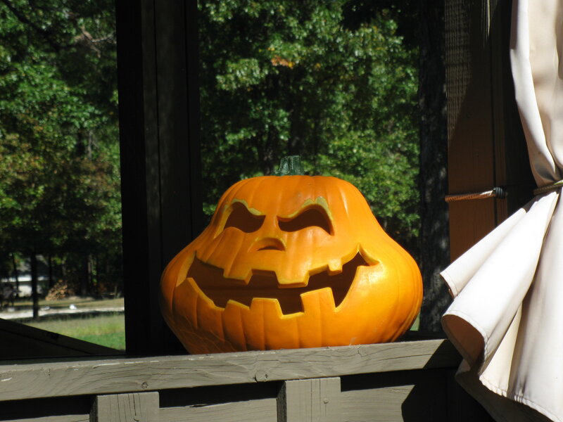 Carved pumpkin on porch