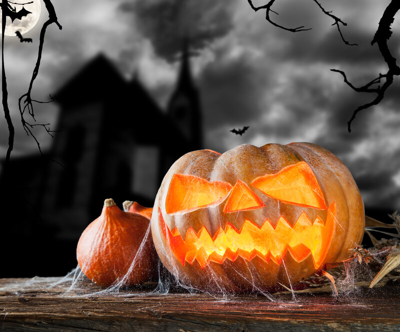 Carved Pumpkin on Table — Orange, Creepy