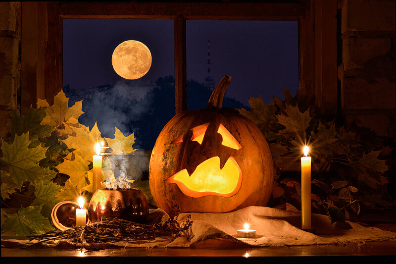 Carved Pumpkin on Windowsill — Orange