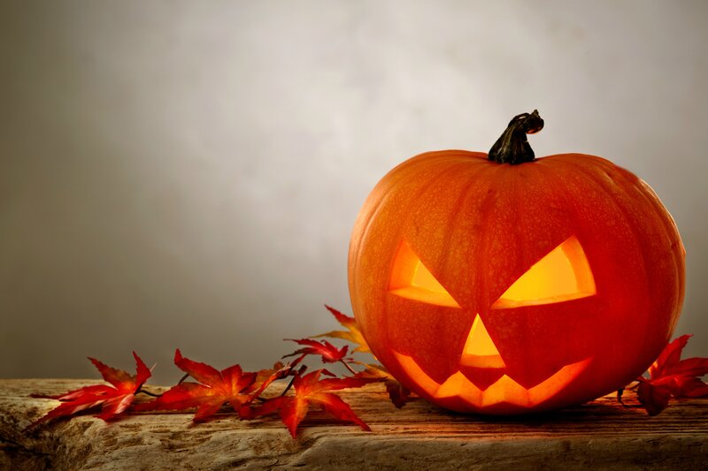 Carved Pumpkin on Wood — Orange