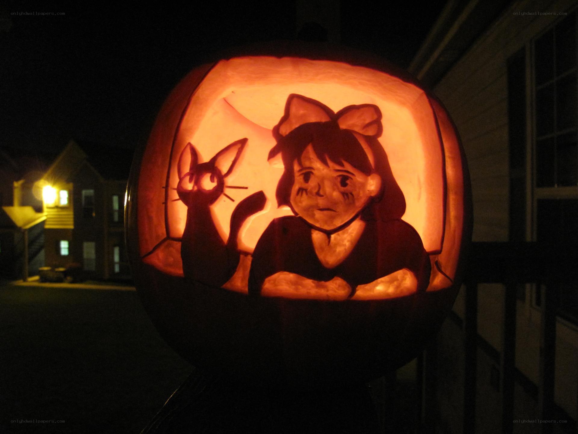 carved pumpkin with anime characters