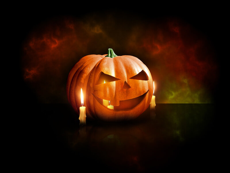 Carved Pumpkin with Candles — Orange, Spooky