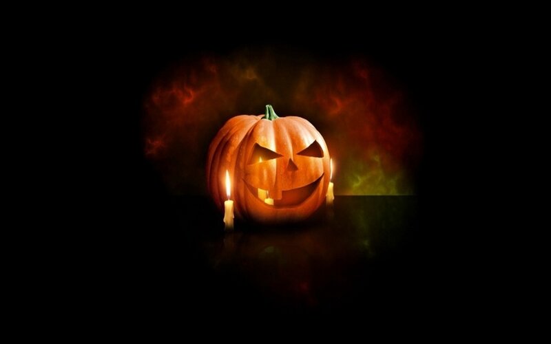 Carved Pumpkin with Candles — Orange