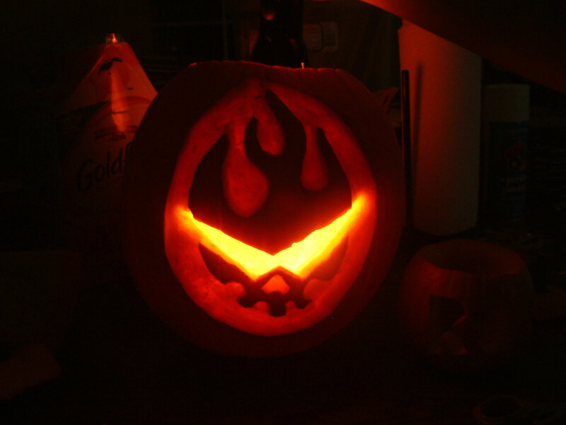 carved pumpkin with flame design