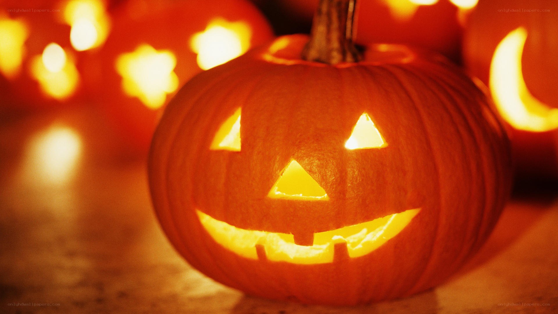 carved pumpkin with glowing face