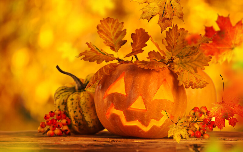 Carved Pumpkin with Leaves — Orange, Festive, Autumn