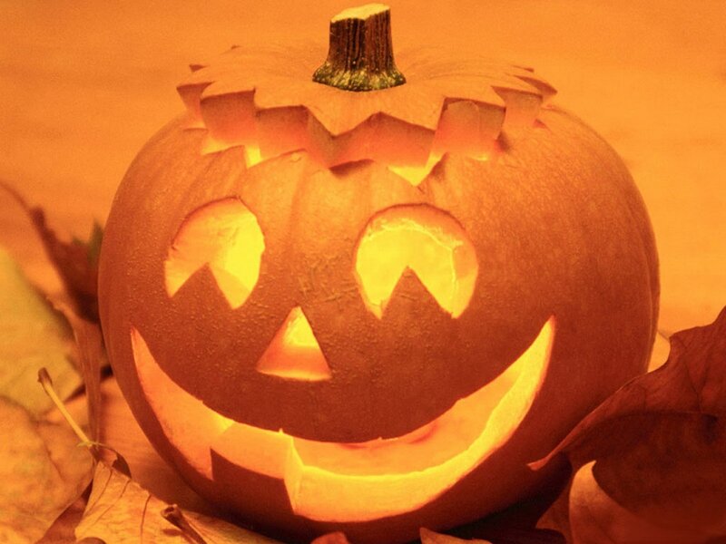 carved pumpkin with light