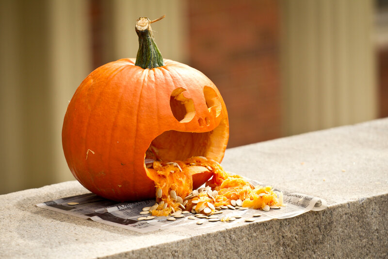 carved pumpkin with seeds