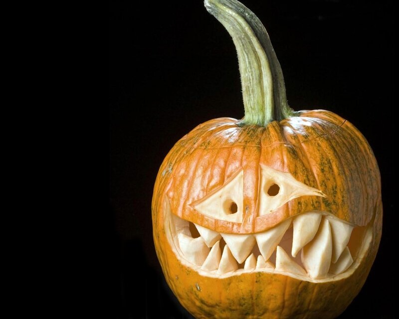 carved pumpkin with sharp teeth