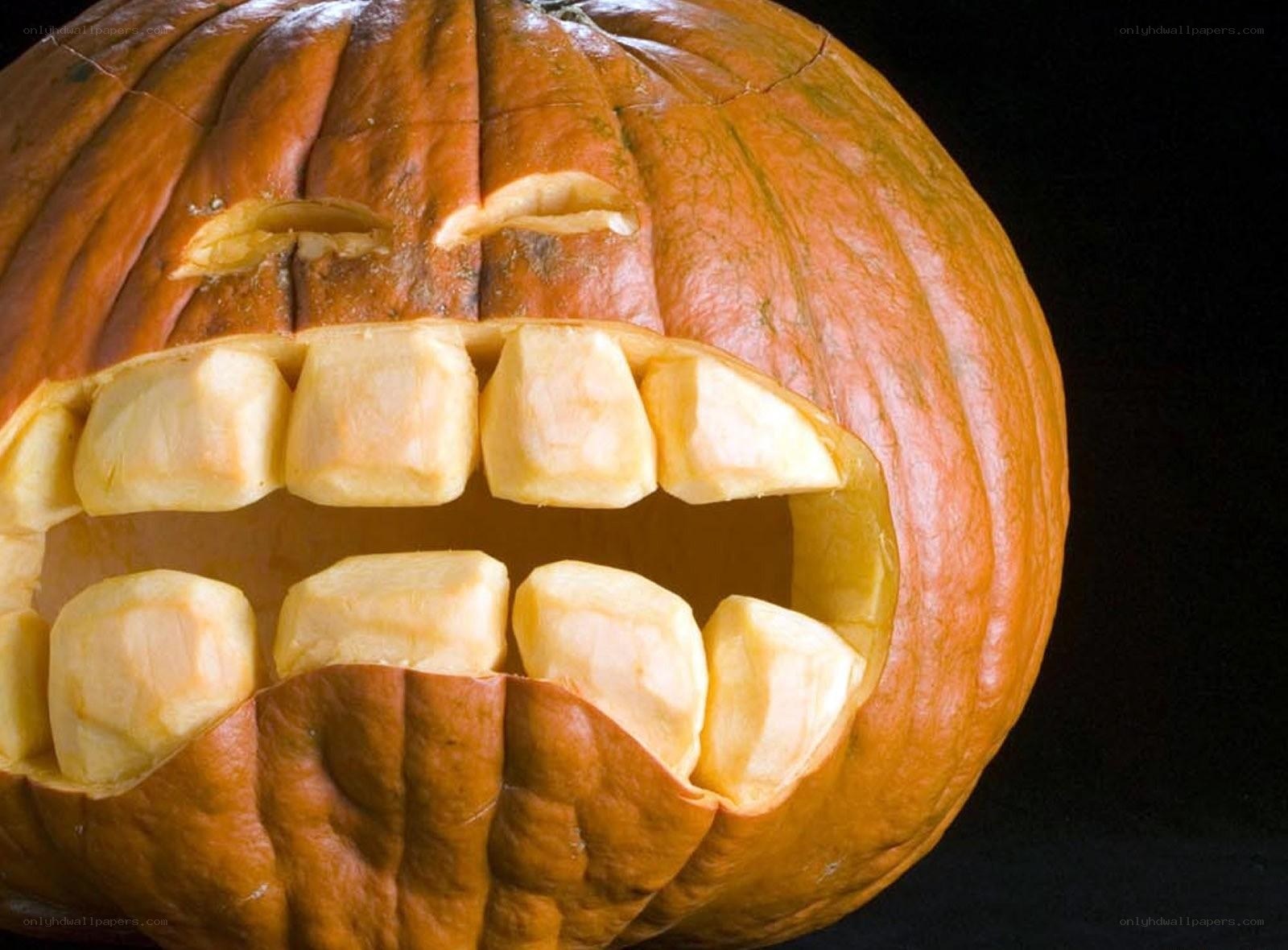 carved pumpkin with teeth