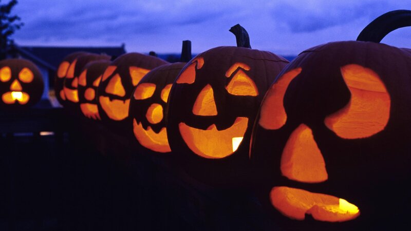 Carved pumpkins at dusk