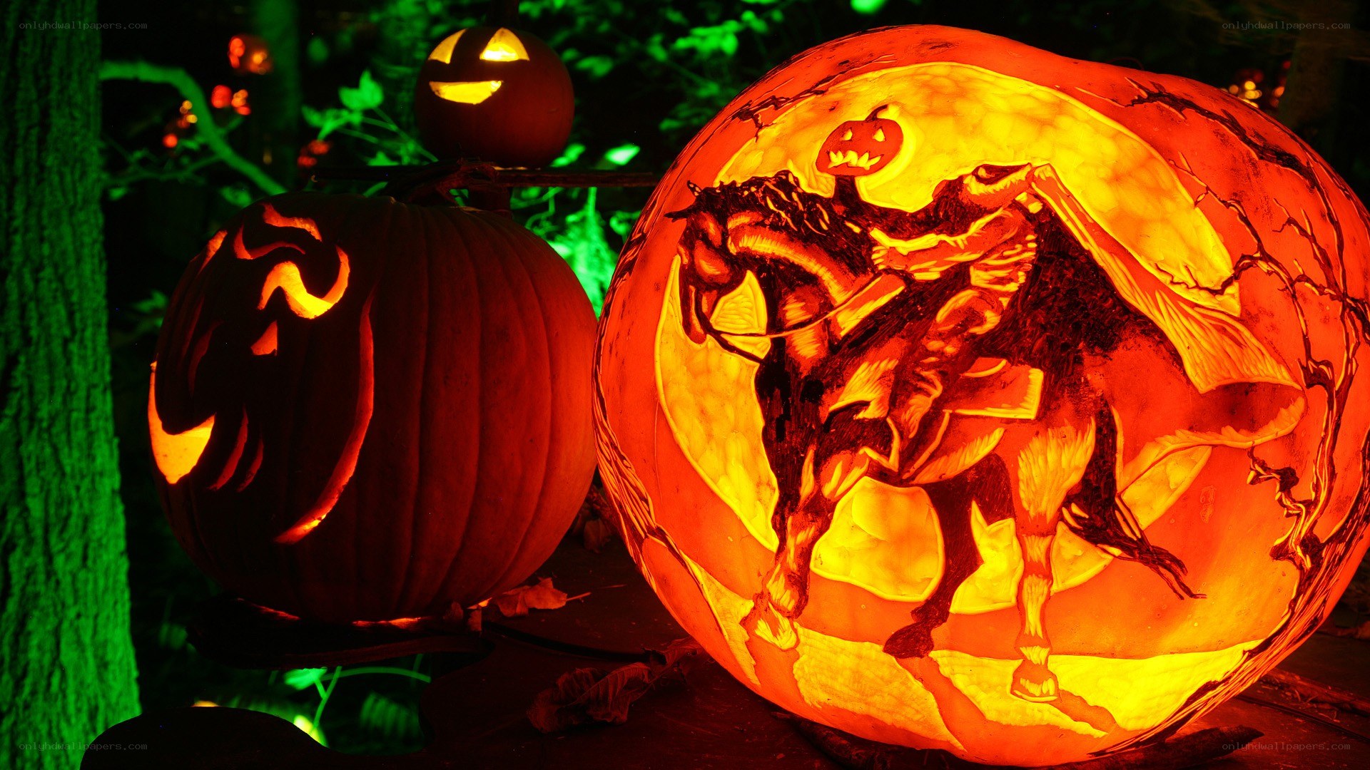 Carved pumpkins at night