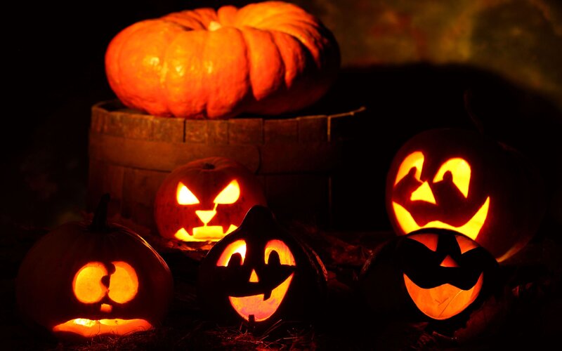 Carved Pumpkins at Night — Orange, Dark, Photograph