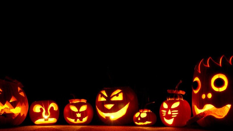 Carved Pumpkins in Dark — Orange