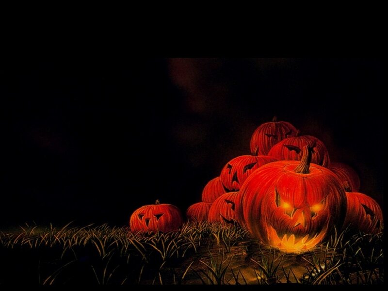 Carved Pumpkins in Field