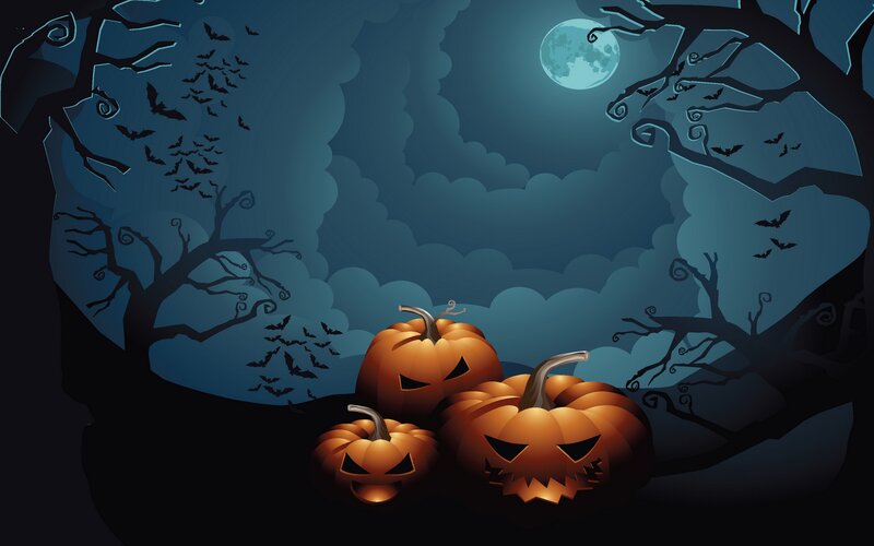 Carved Pumpkins in Forest — Orange