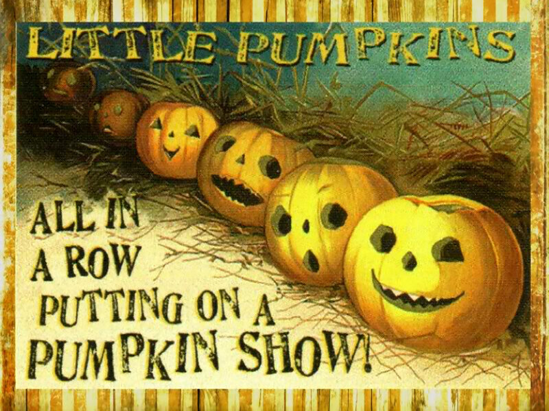 Carved Pumpkins in Hay — Yellow