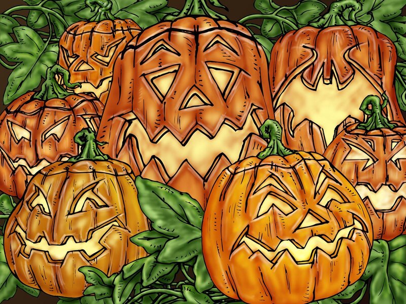 Carved Pumpkins in Leaves