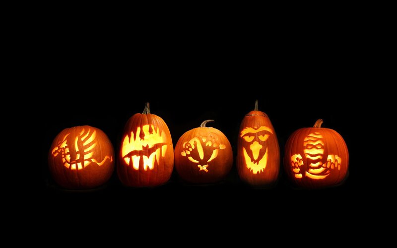 Carved Pumpkins in Row — Orange, Spooky