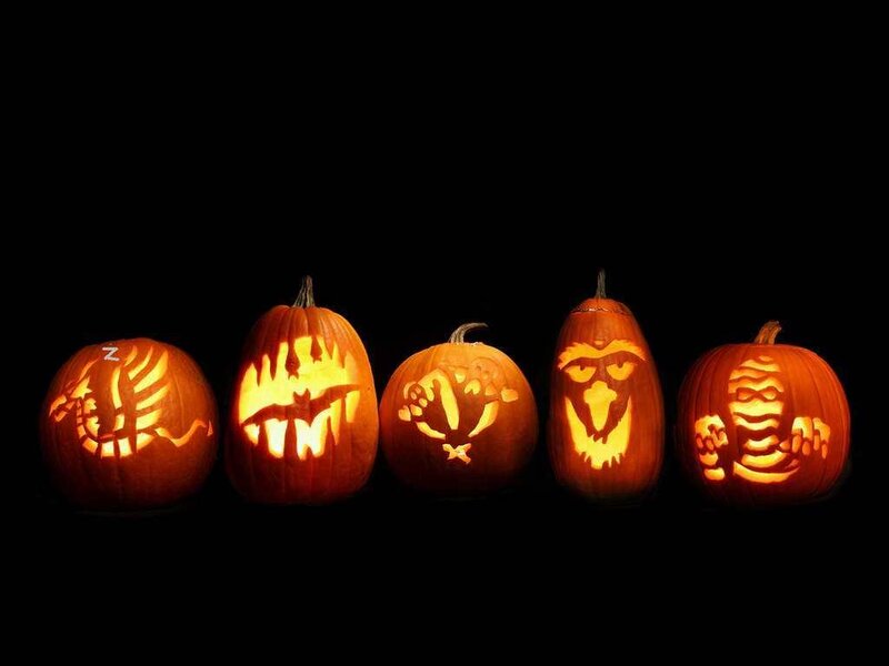 Carved Pumpkins in Row