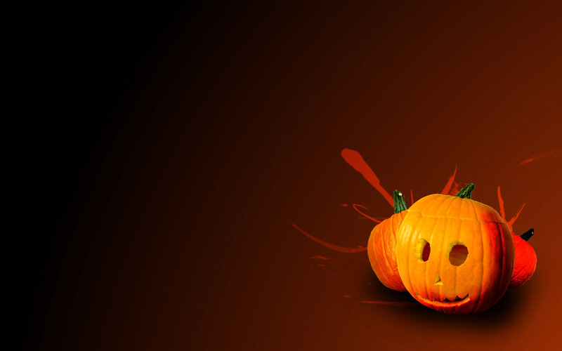 Carved Pumpkins on Dark Background